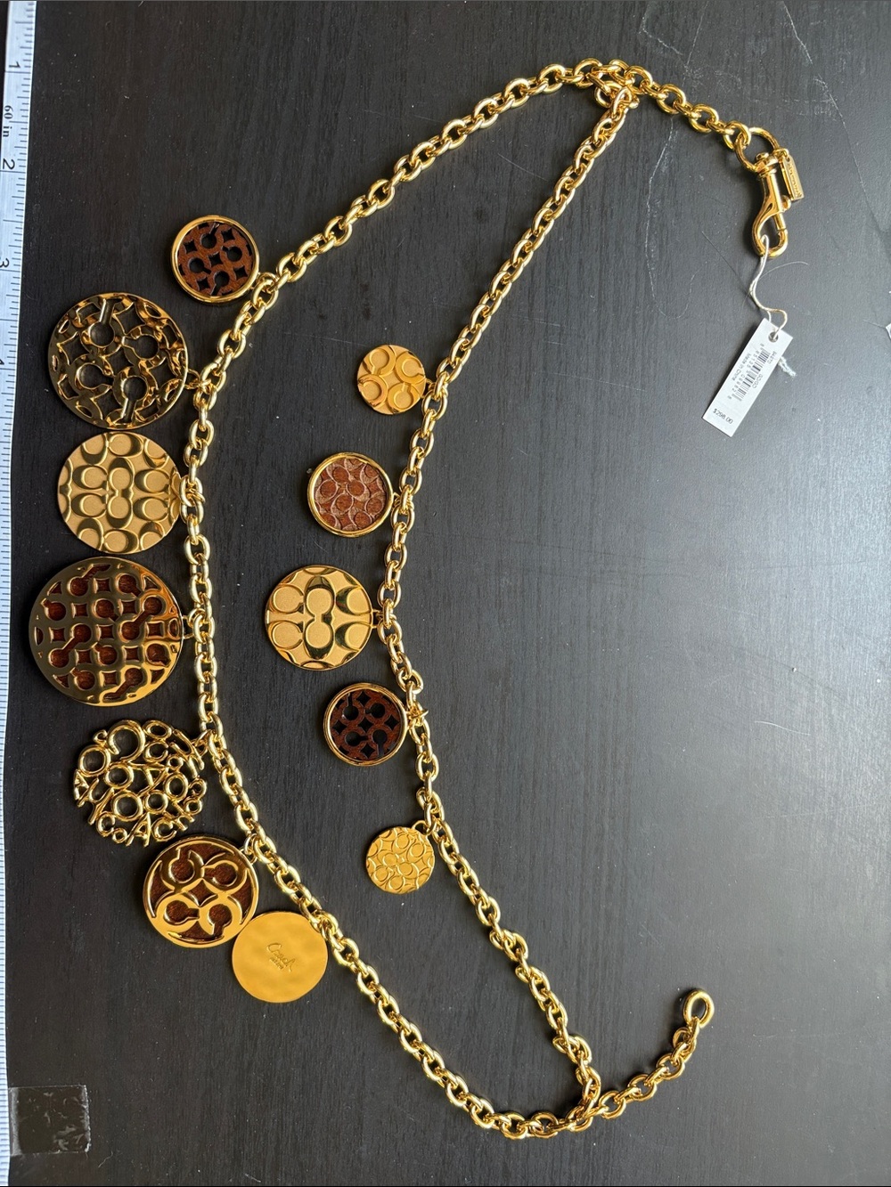 Coach Vintage Gold-Tone Multi Medallion Necklace Wood and Gold Tone Metal.